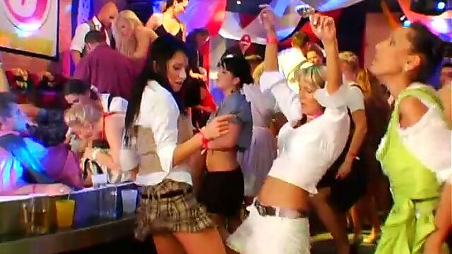 Naughty girls are dancing and touching each other