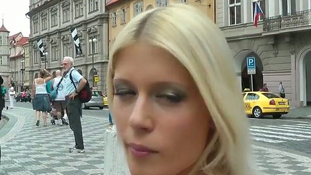 Arousing Russian blondie masturbates before giving a head in public