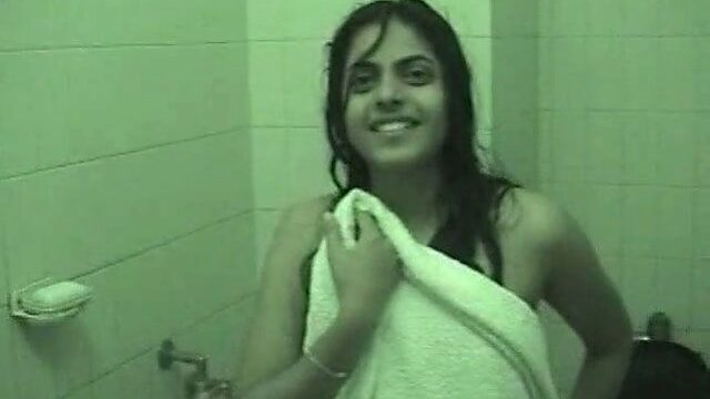 Amateur Indian brunette takes a shower on cam and shows her big ass