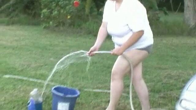 Wet carwash outdoor featuring nasty Caucasian BBW slut