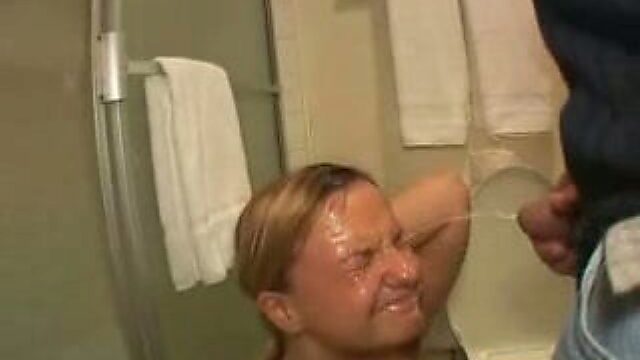 Whorish chick Kat Lynn enjoys taking cumshot shower in the toilet