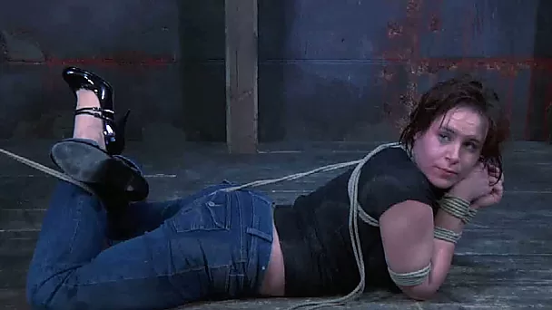 Perverted red haired chick ties up sex-slaved right on the cold floor