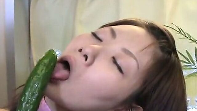 Miku Masaki gets her pussy fucked with cucumber