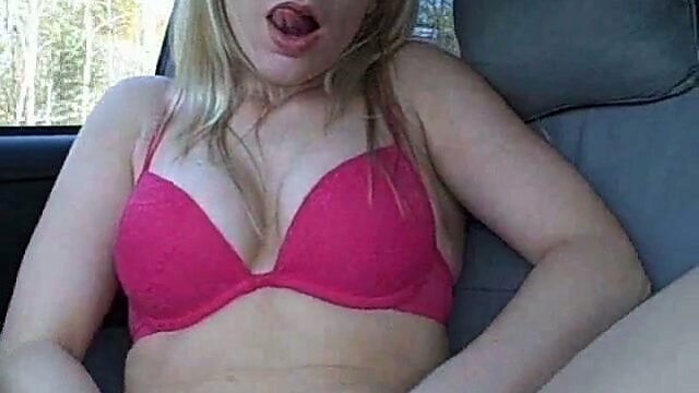 This blonde is totally willing to masturbate for her BF right in his car