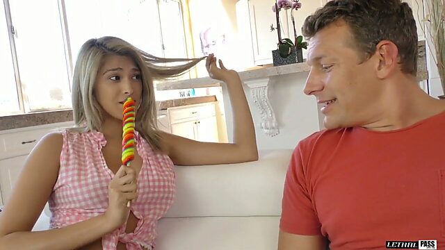 Charming teen Stephanie West sucks a lolly pop and gets her pussy licked and fucked