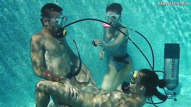 Diving instructor fucks nice babe in scuba Lizzy under the water
