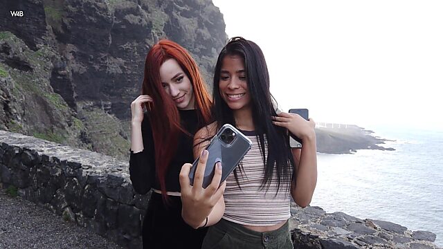 Two beautiful models take a good selfie