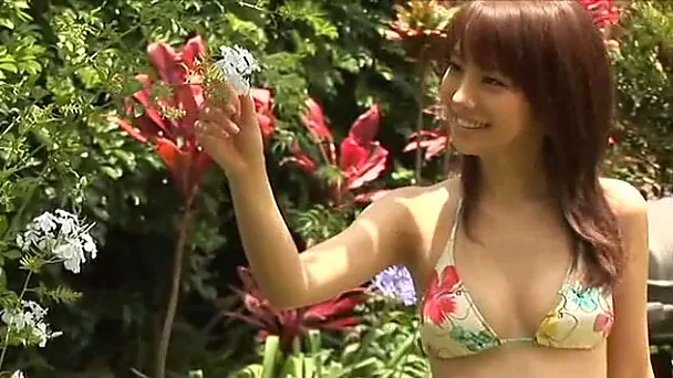 Nice Asian chick Azusa Yamamoto demonstrates her body in the yard