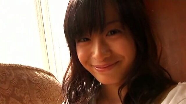 Cheerful Japanese cutie Seishun no Hikari massages herself with roller